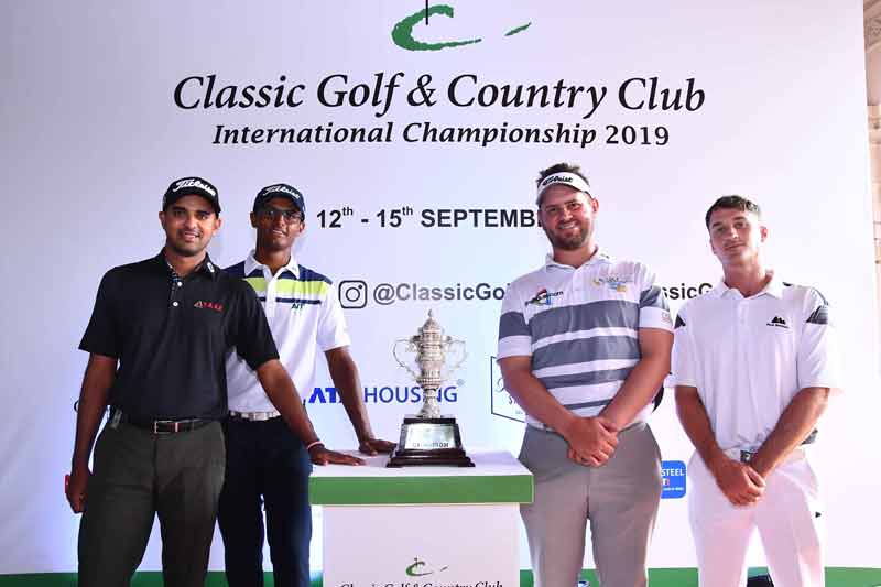 Golfers Khalin Joshi Viraj Madappa Daniel Van Tonder Malcolm Kokocinski with the Classic Golf Country Club International Championship trophy