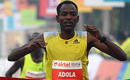 Defending Champion Guye Adola in action