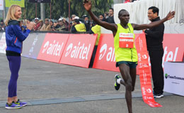 Overall-Elite-Mens-Winner-Guye-Adola-at-finished-Line