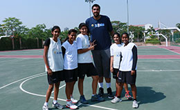 Sim Bhullar with a few kids from the Junior NBA Elite National Camp