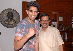 Vijender Singh with Arvind Kejriwal