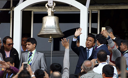 Former cricketer Sunil Gavaskar rings the bell during the third ODI between India and England at Eden Gardens