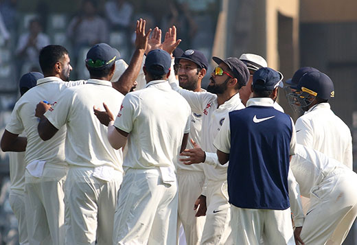 Ravichandran Ashwin L and Virat Kohli celebrate fall of Ben Stokes wicket on Day 2 of the fourth test match between India and England