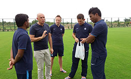 Constantine with his support staff at the training site on Sunday