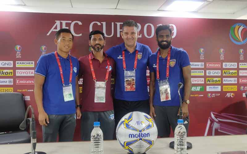 From R to L CFC First Team Player CK Vineeth CFC Head Coach John Gregory MPFC Head Coach Sachin Badadhe MPFC First Team Player Thoiba Singh