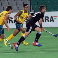 Huttermann-Henning-of-GER-in-action-against-AUS-in-their-HHJW-Cup-Men-2013-match-on-12th-Dec-2013-at-Delhi