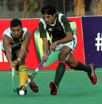 Irfan-Muhammad-player-of-PAK-in-action-against-RSA-in-their-HHJW-Cup-Men-2013-match-on-12th-Dec-2013-at-Delhi