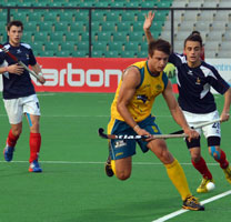 Kershaw-Aaron-of-AUS-in-action-against-FRA-in-thier-Hero-Hockey-Junior-World-Cup-2013-on-9th-Dec-2013-at-Delhi