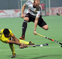 Rupinder-Singh-of-IND-in-action-against-GER-in-their-HHWL-Men-Final-2014