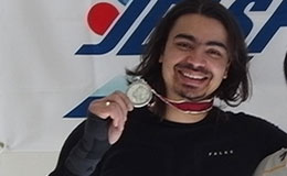 Shiva Keshavan Indian Luge Player with silver medal