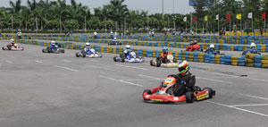Vishnu-Prasad-of-Meco-Racing-Senior-Max-races-at-the-Round-2-of-10th-JKRMNKC-2013-in-Hyderabad