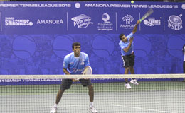 Arun-Prakash-of-Accurate-Aces-serves-as-Sriram-Balaji-looks-on-against-Ramkumar-Ramanathan-and-V-M-Ranjeet-of-Vibrant-Volleyers-Arun-and-Sriram