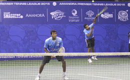 Arun-Prakash-of-Accurate-Aces-serves-as-Sriram-Balaji-looks-on-against-Ramkumar-Ramanathan-and-V-M-Ranjeet-of-Vibrant-Volleyers-Arun-and-Sriram